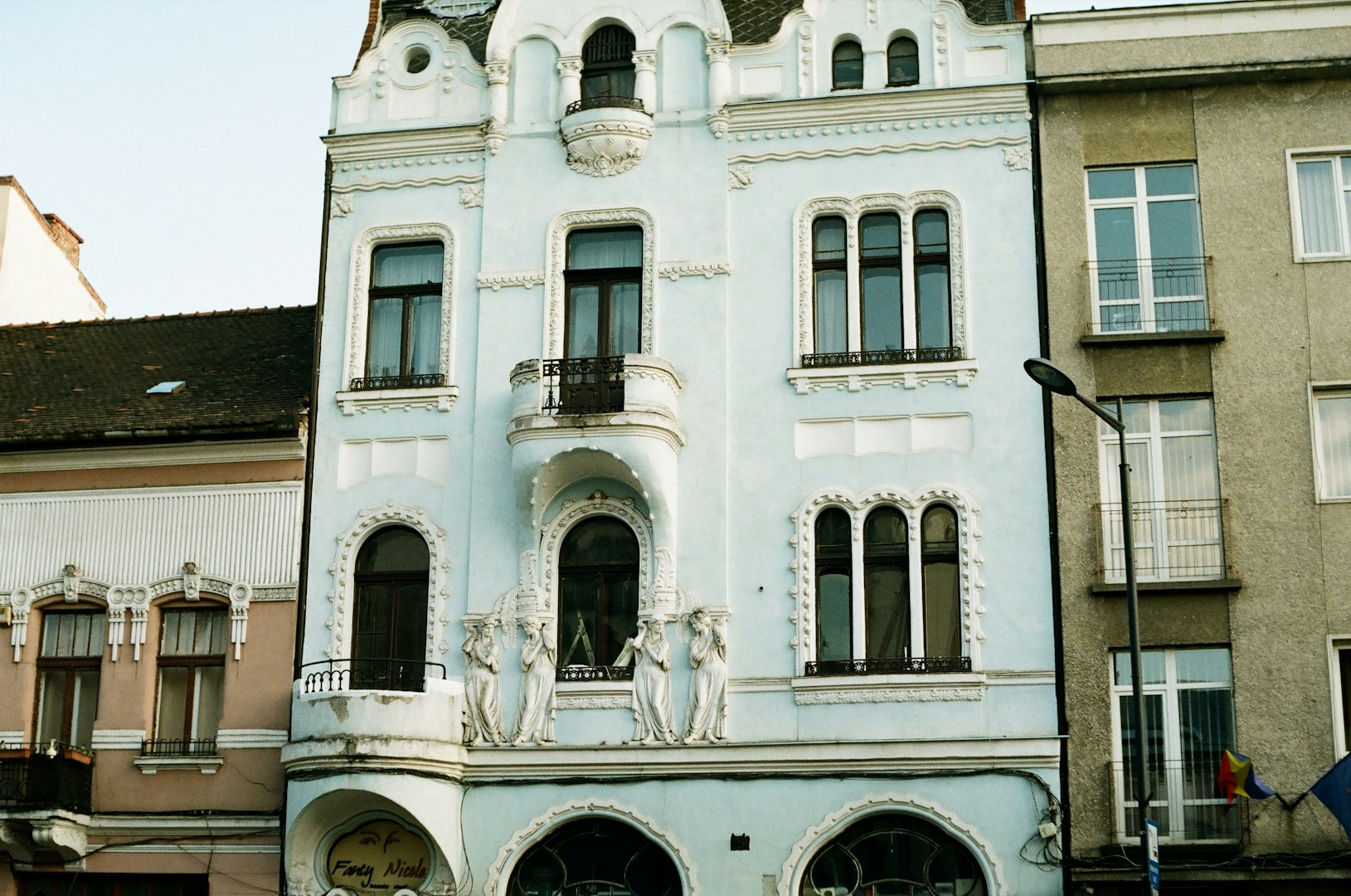a crane lifting a building